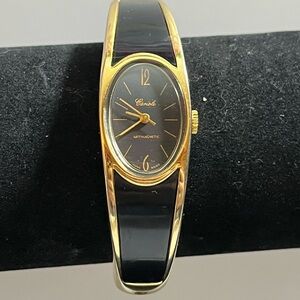 Vintage Cariole mechanical bangle watch - gold tone and black acrylic WORKING